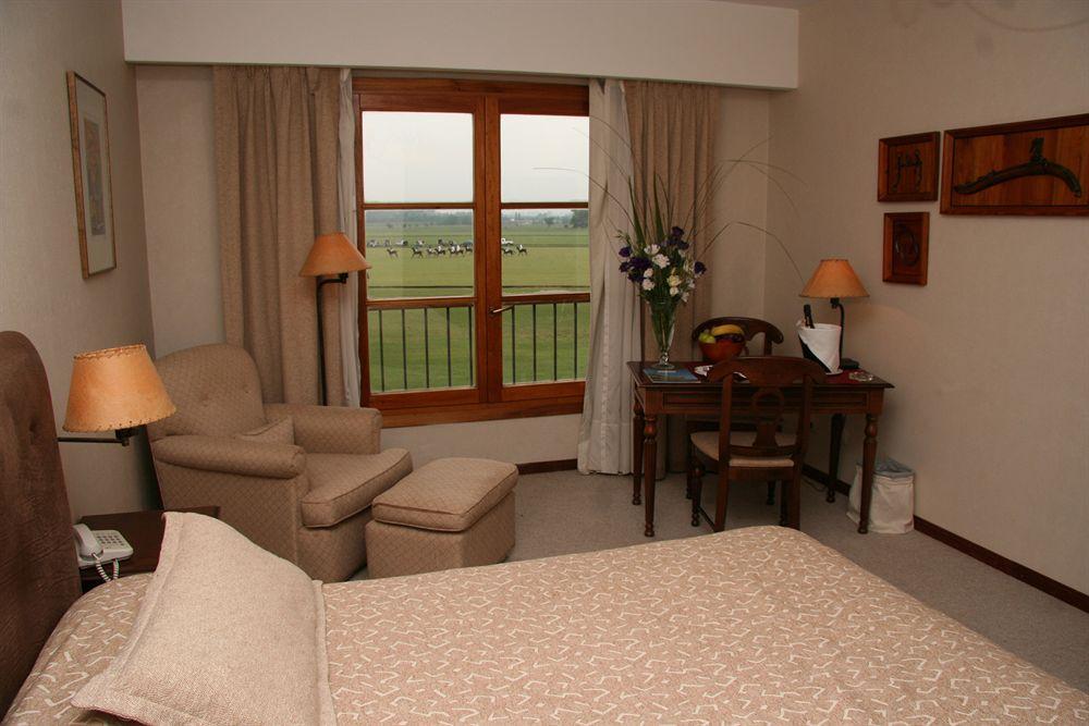 Отель Wyndham Garden Lujan Экстерьер фото
